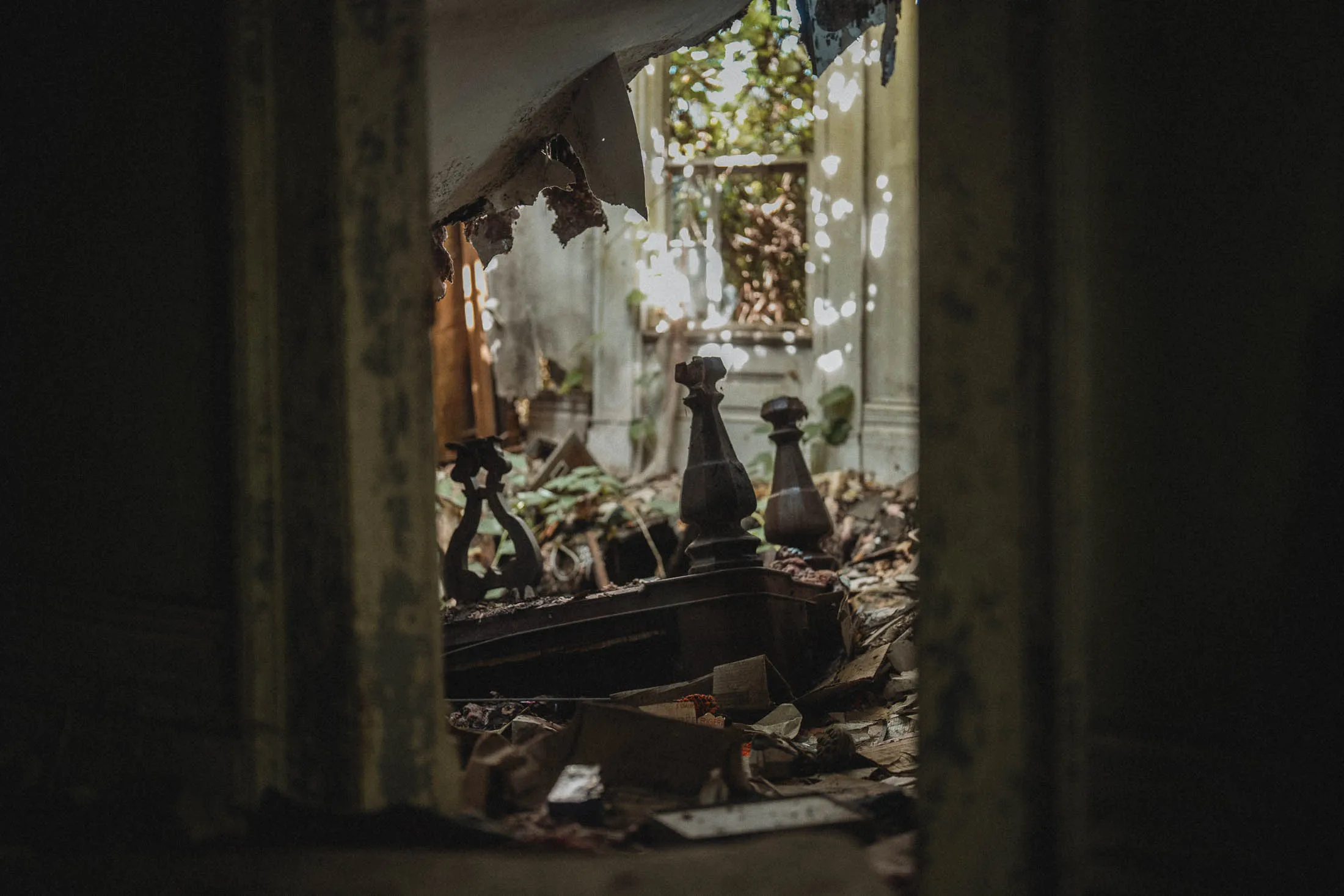 Upside-down piano inside collapsed farmhouse parlor, Cadillac House