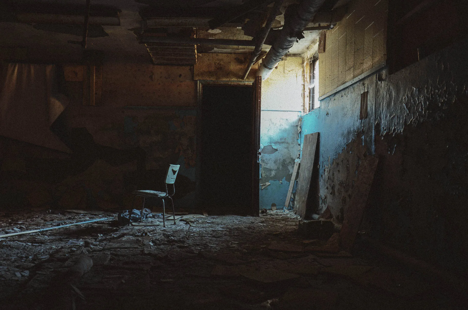 Basement classroom with a lone chair inside Charlotte Kenyon Elementary School