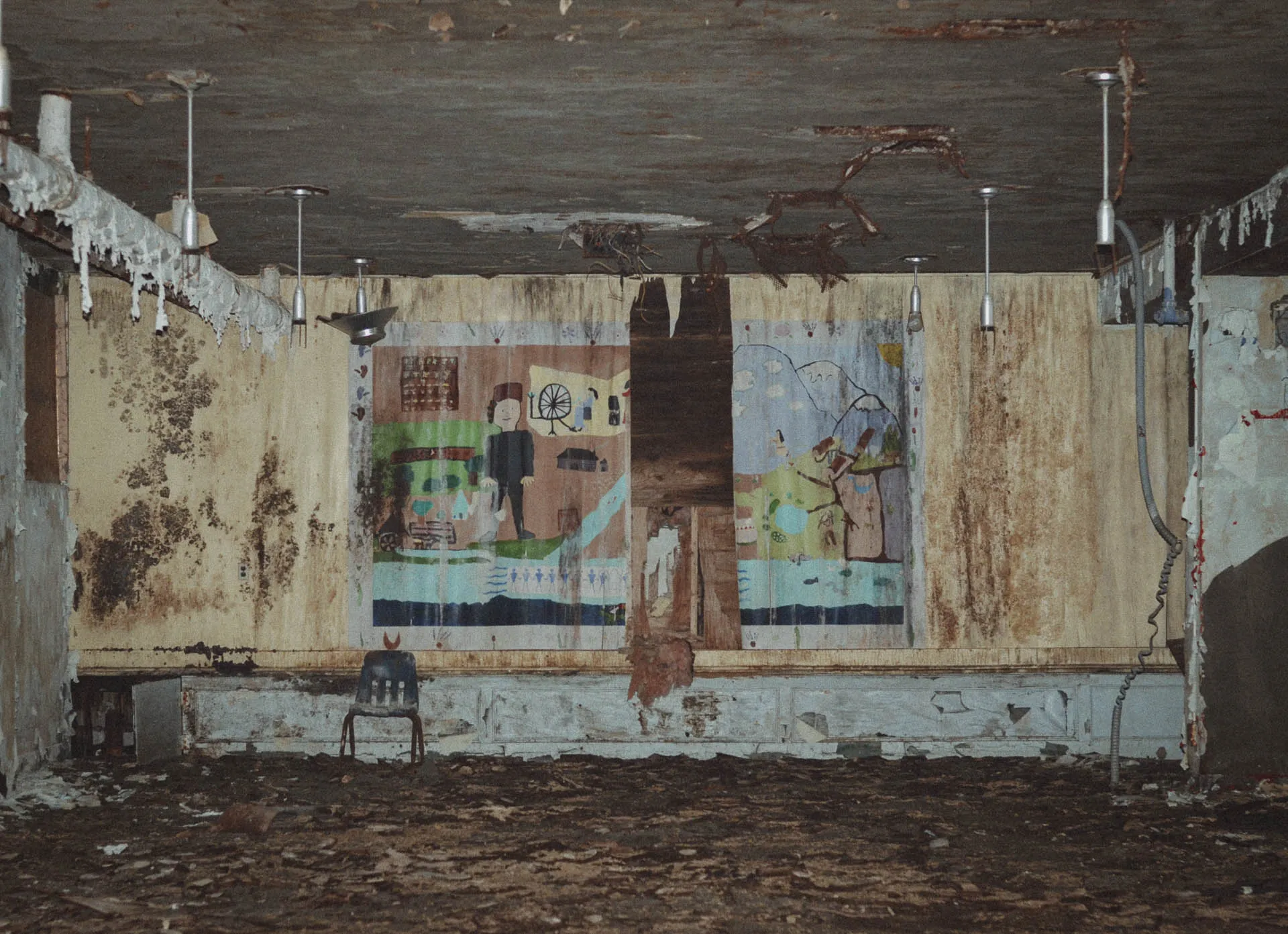 Hand-painted cafeteria mural inside Charlotte Kenyon Elementary School