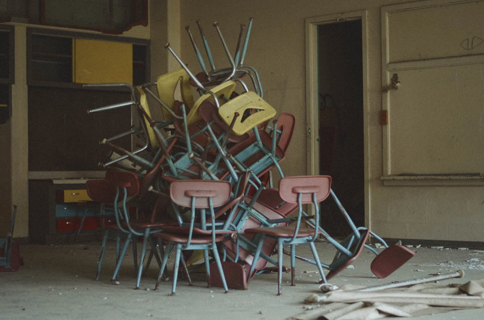 Stacks of chairs and supplies in the art classroom at Charlotte Kenyon Elementary