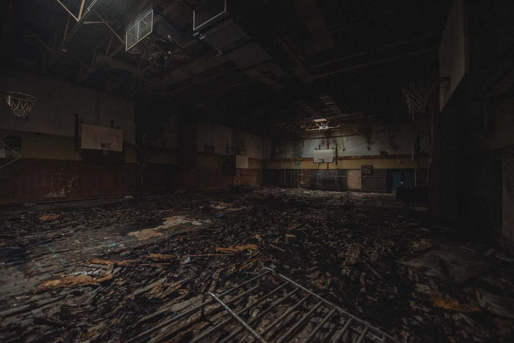 Gymnasium and cafetorium stage inside the abandoned Columbus School