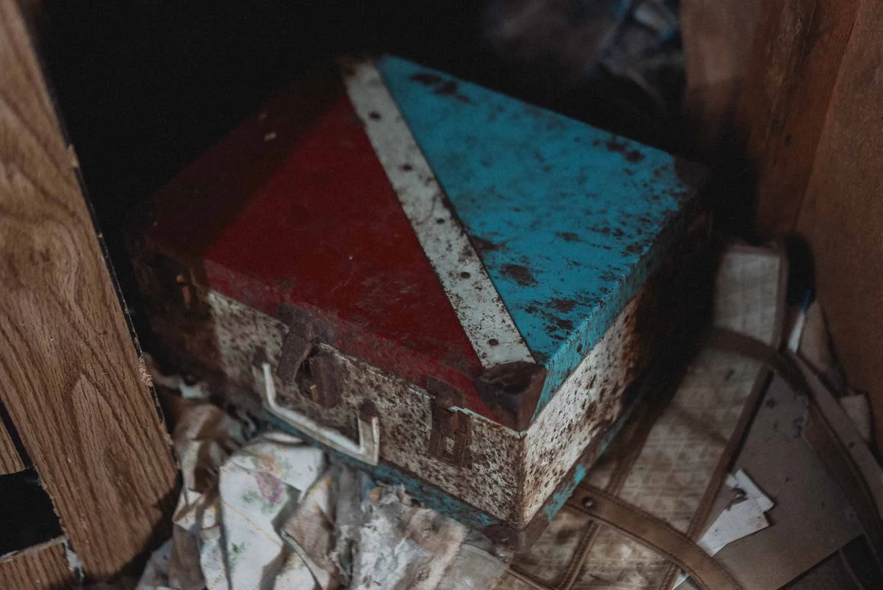 Vintage red-white-and-blue metal roller-skate box found inside the Dog House barndominium