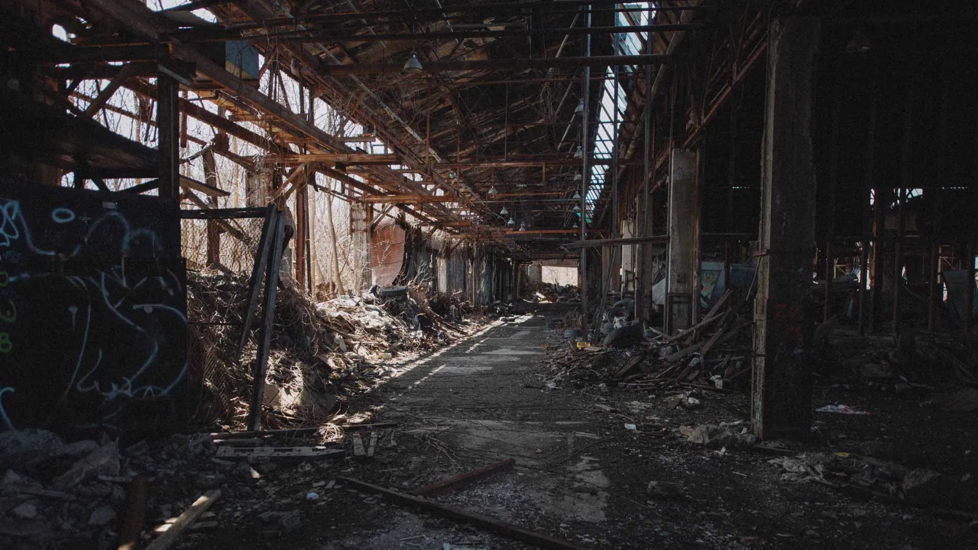 Crumbling masonry walls and exposed framing inside the D.W. Winkelman Co. warehouse