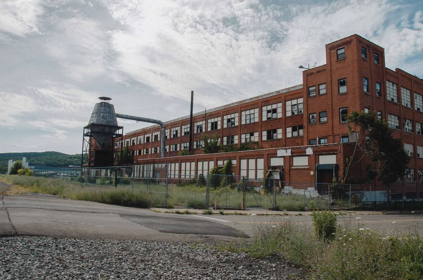 Rear elevation of the Fair Play Factory showing brick loading bays in July 2016