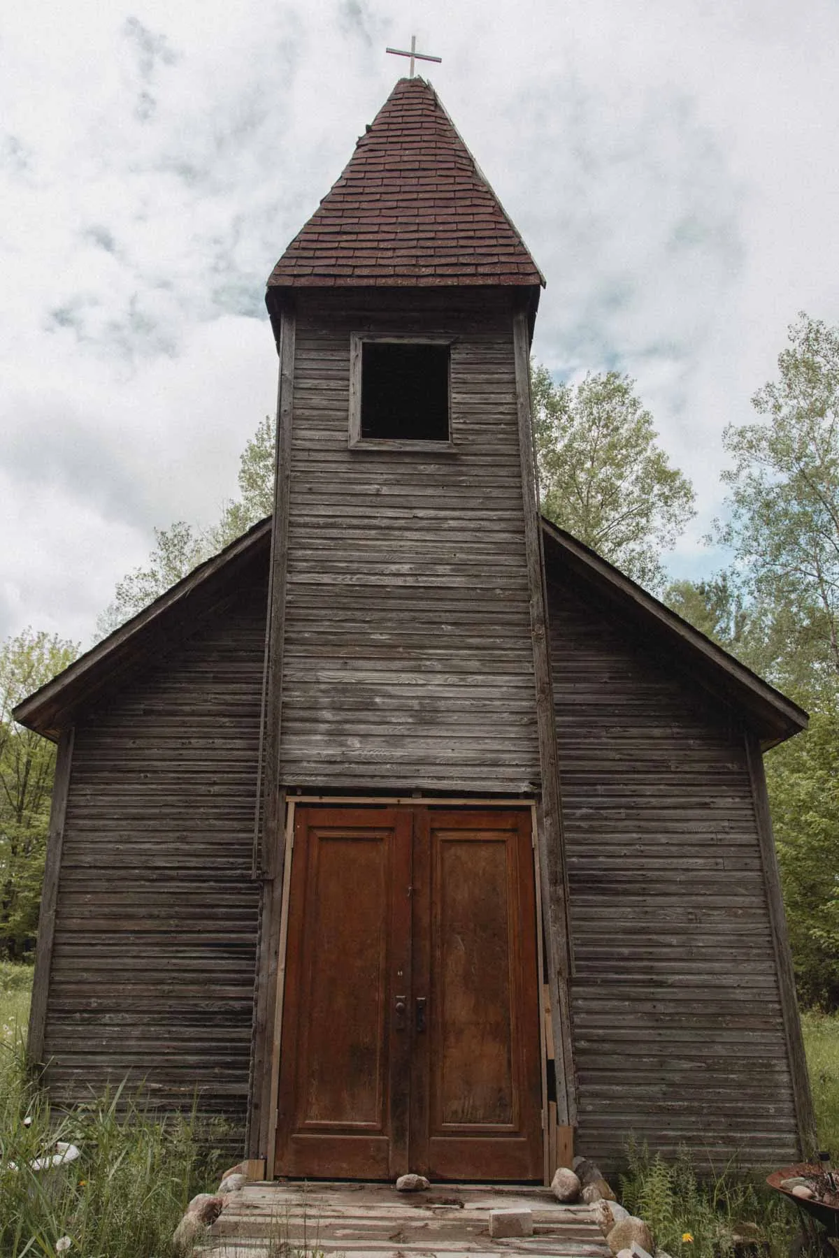 Boarded entrance of the Estonian Evangelical Martin Luther Church in Gleason, Wisconsin
