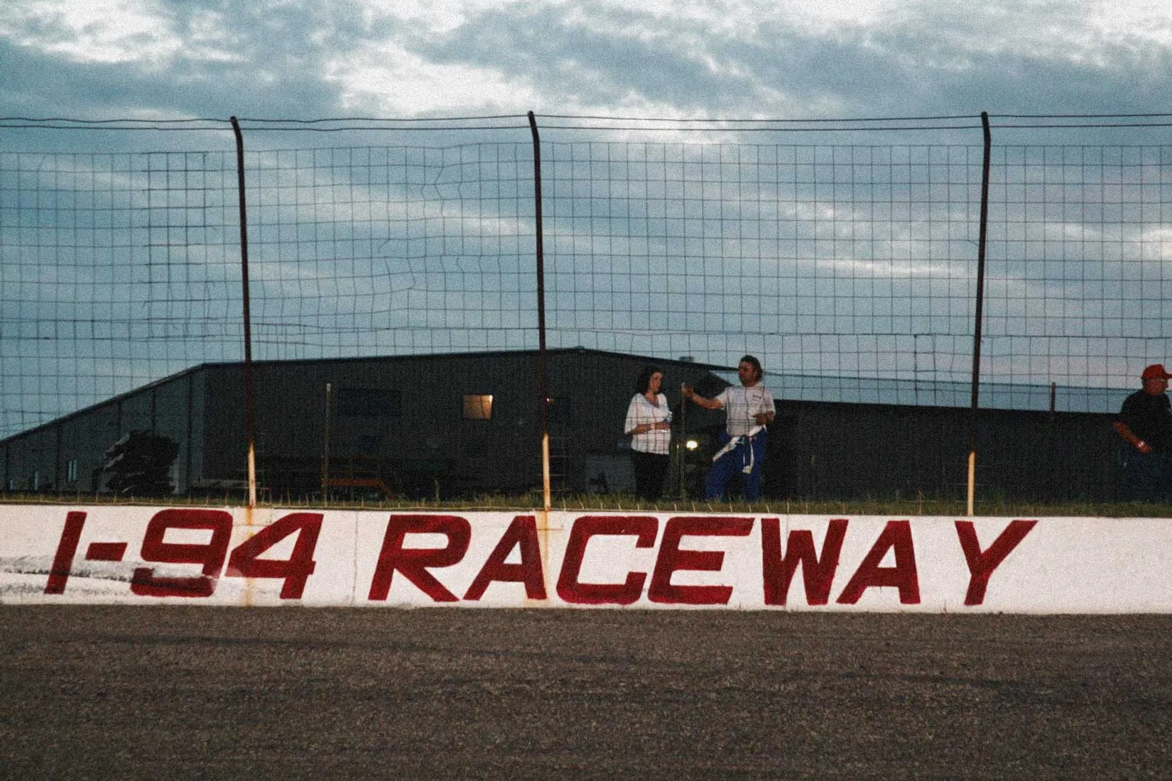 Historic photo of the I-94 Speedway wall logo in its prime