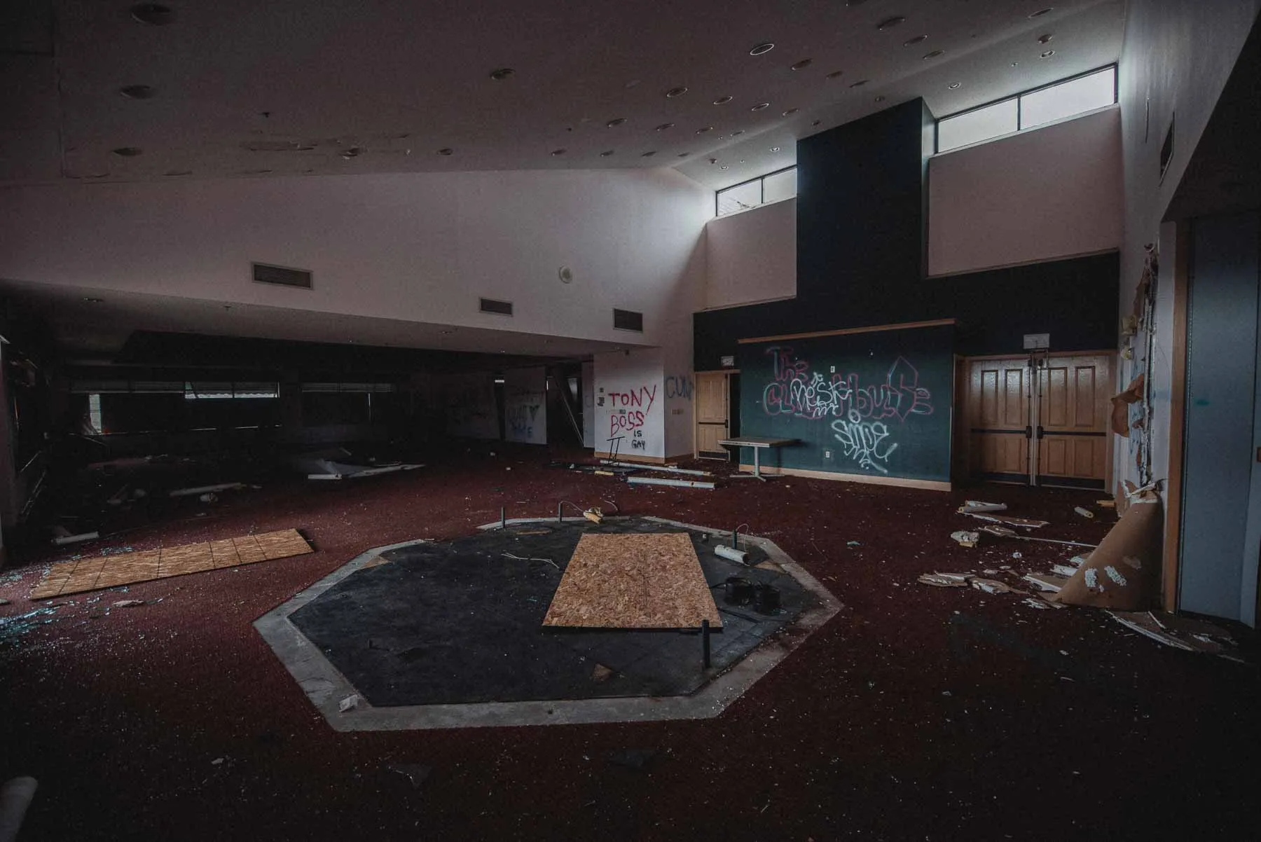 Wood-paneled lobby lounge inside the abandoned LaFayette Hills Golf Country Club