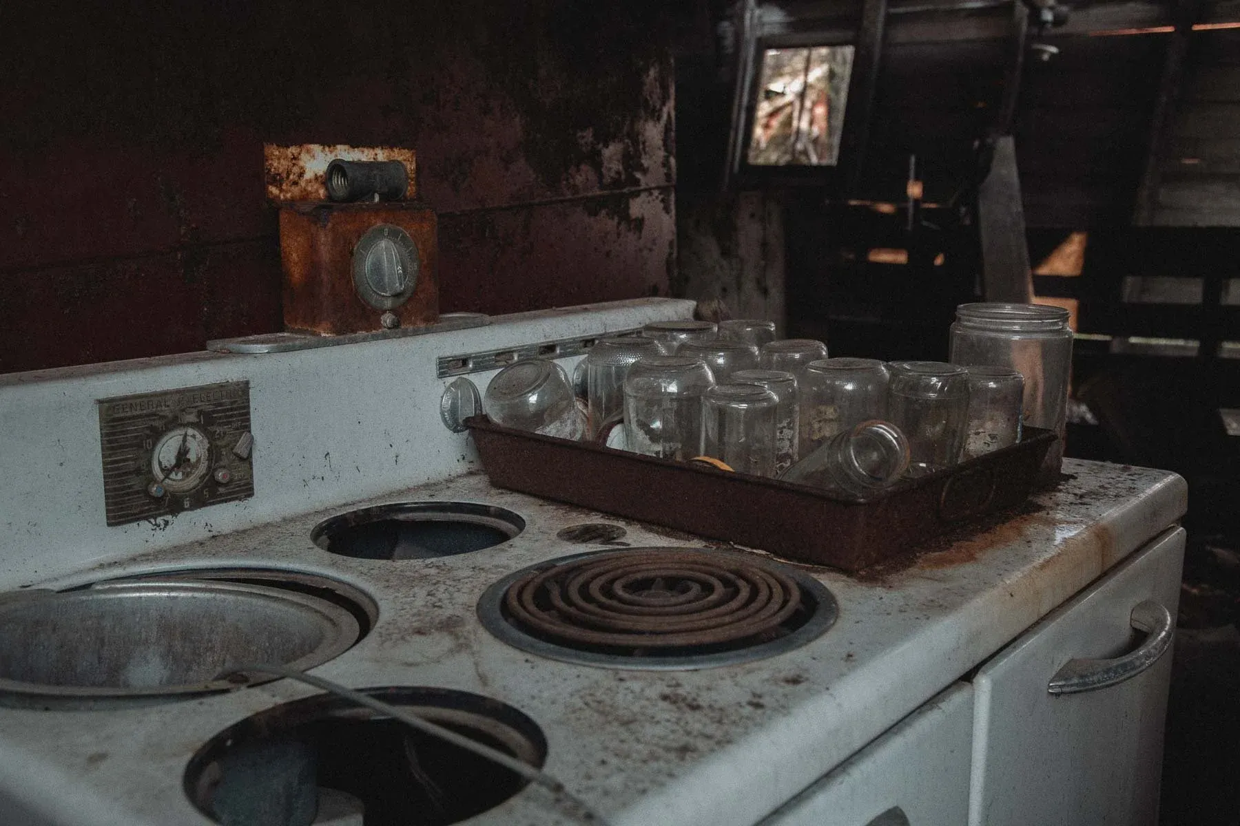 Vintage General Electric stove inside the abandoned Landwehr Century Farm kitchen