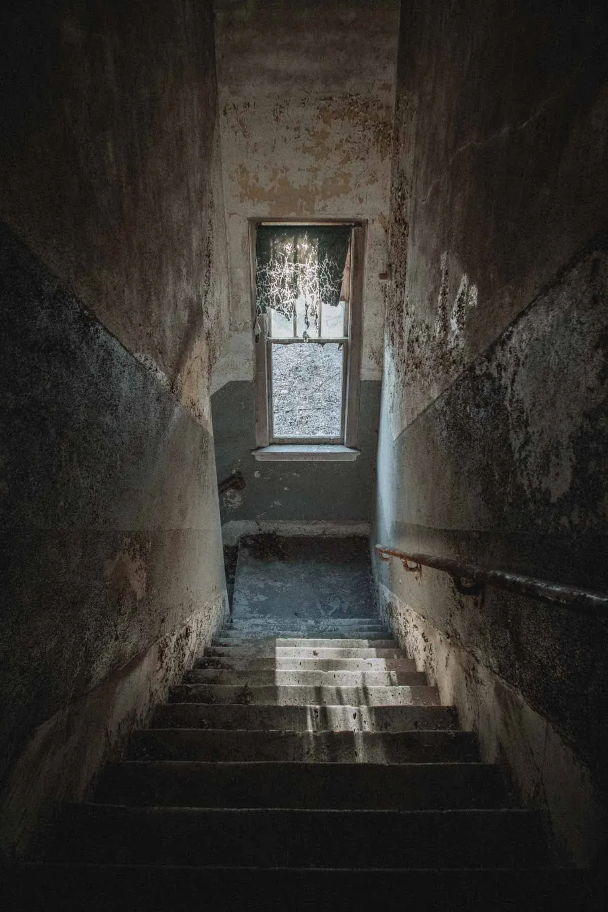 Interior staircase leading up to Moland Hall inside the creamery