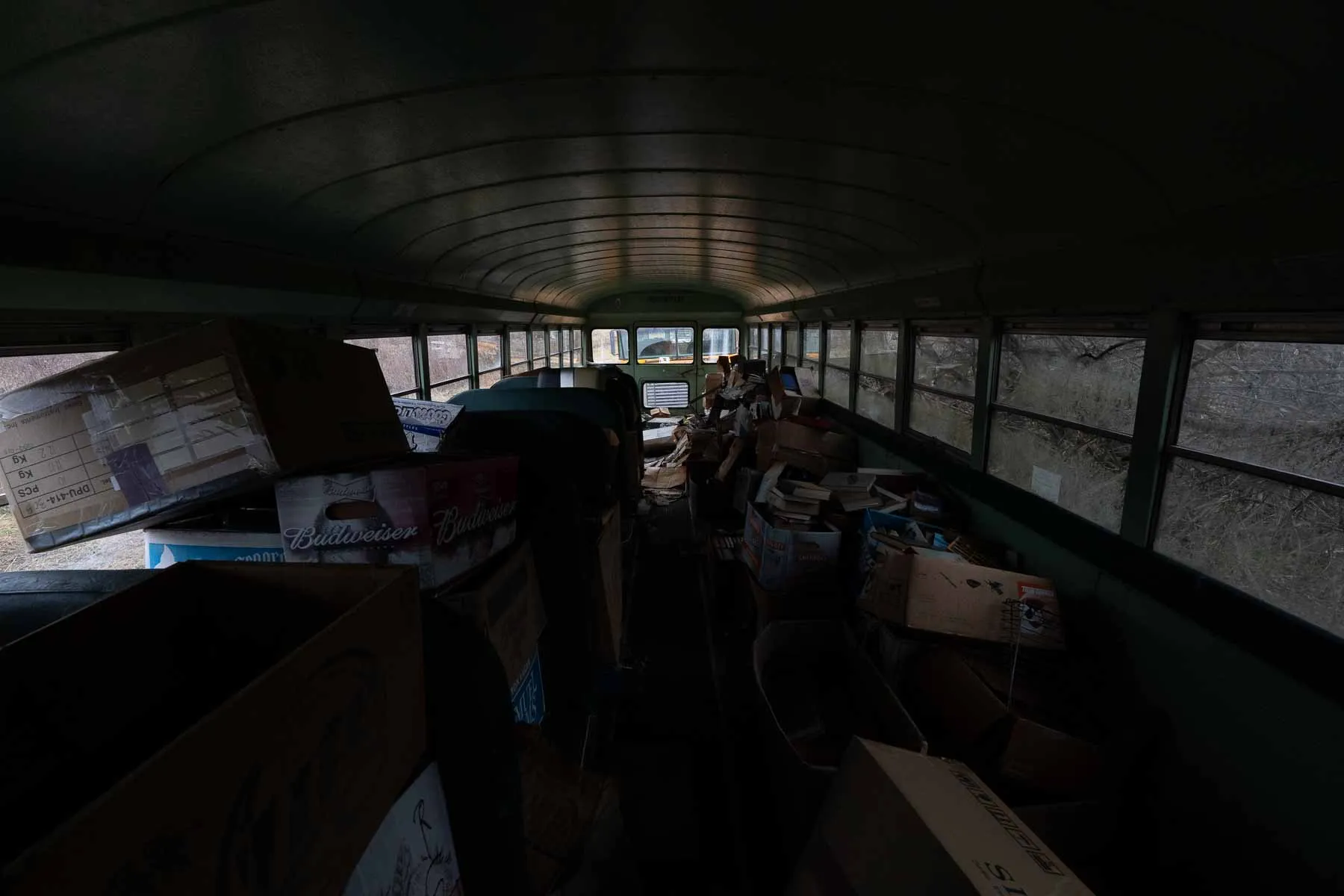 Stored school bus beside the Ransom House workshop