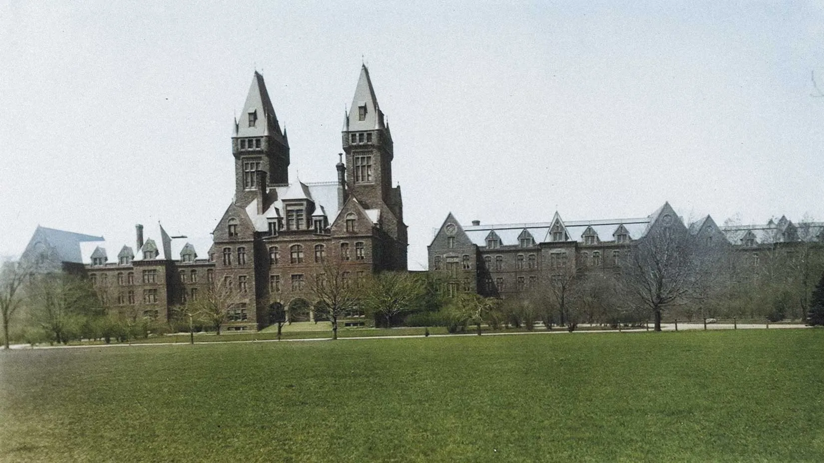 Historic exterior photograph of the Buffalo State Asylum, now the Richardson Olmsted Complex