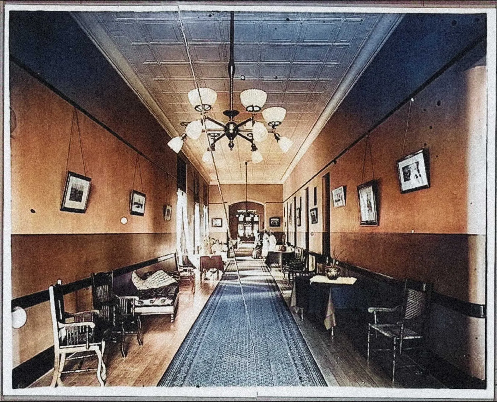 Historic interior hallway with attendants inside the Richardson Olmsted Complex
