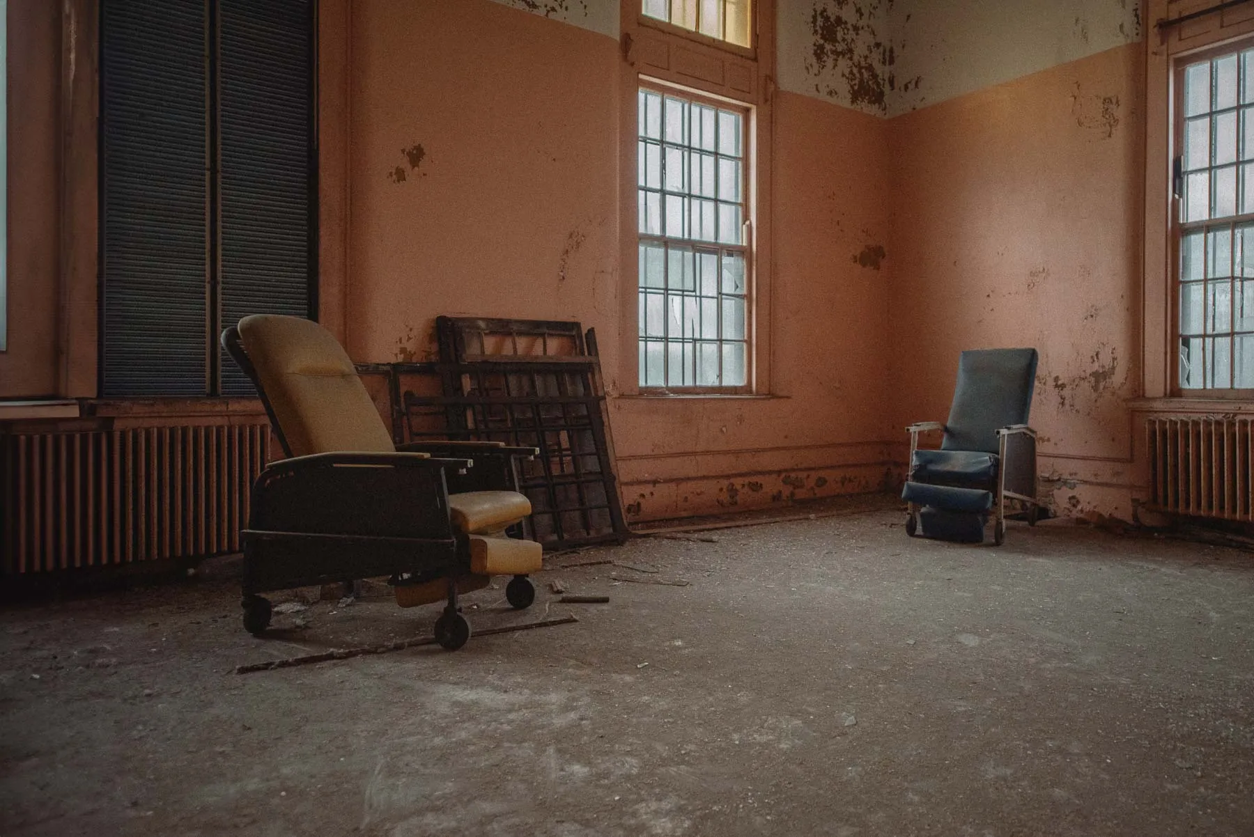 Medical chairs lined against the wall inside the Richardson Olmsted Complex