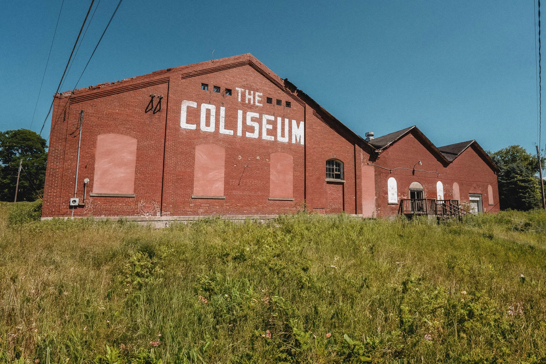 Abandoned roller rink/former trolly powerhouse crumbleing exterior in Ceres, New York