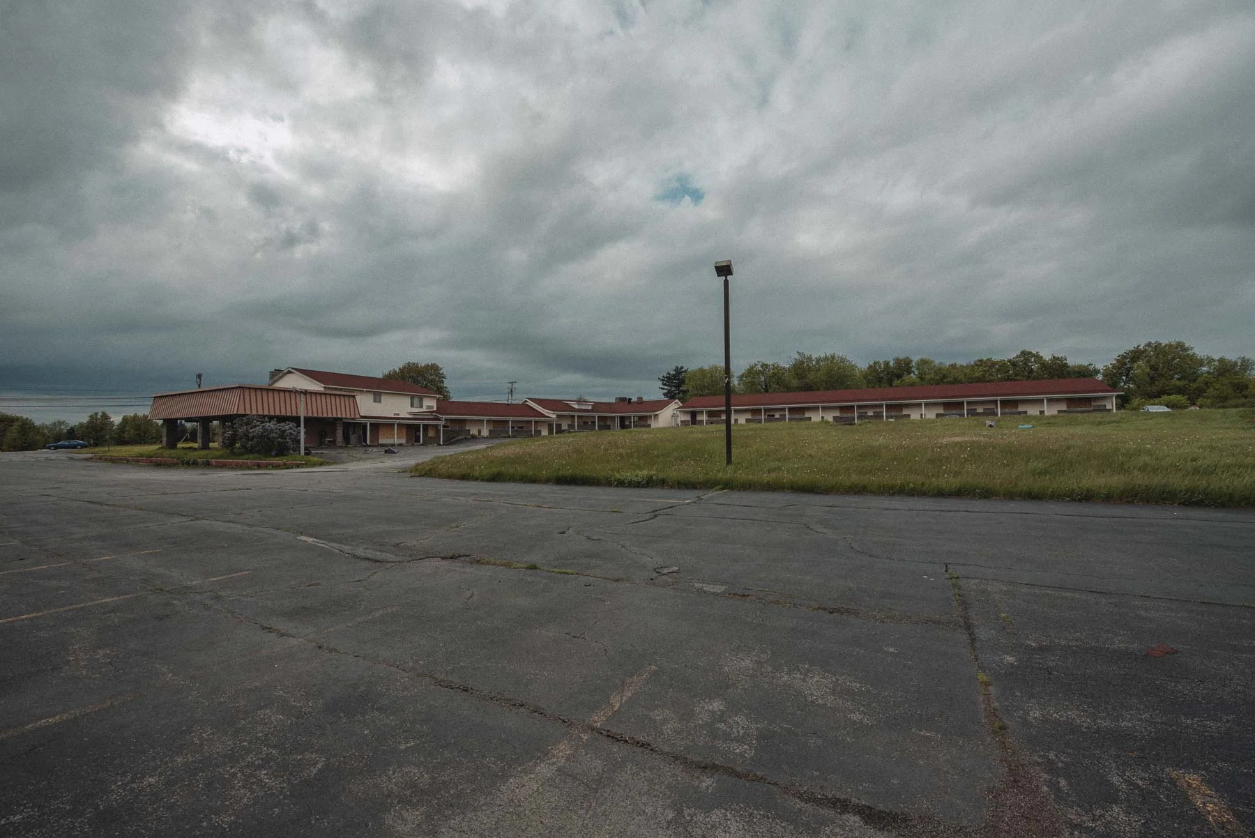 Boarded exterior of the abandoned Vista Heights Inn in Henrietta, New York
