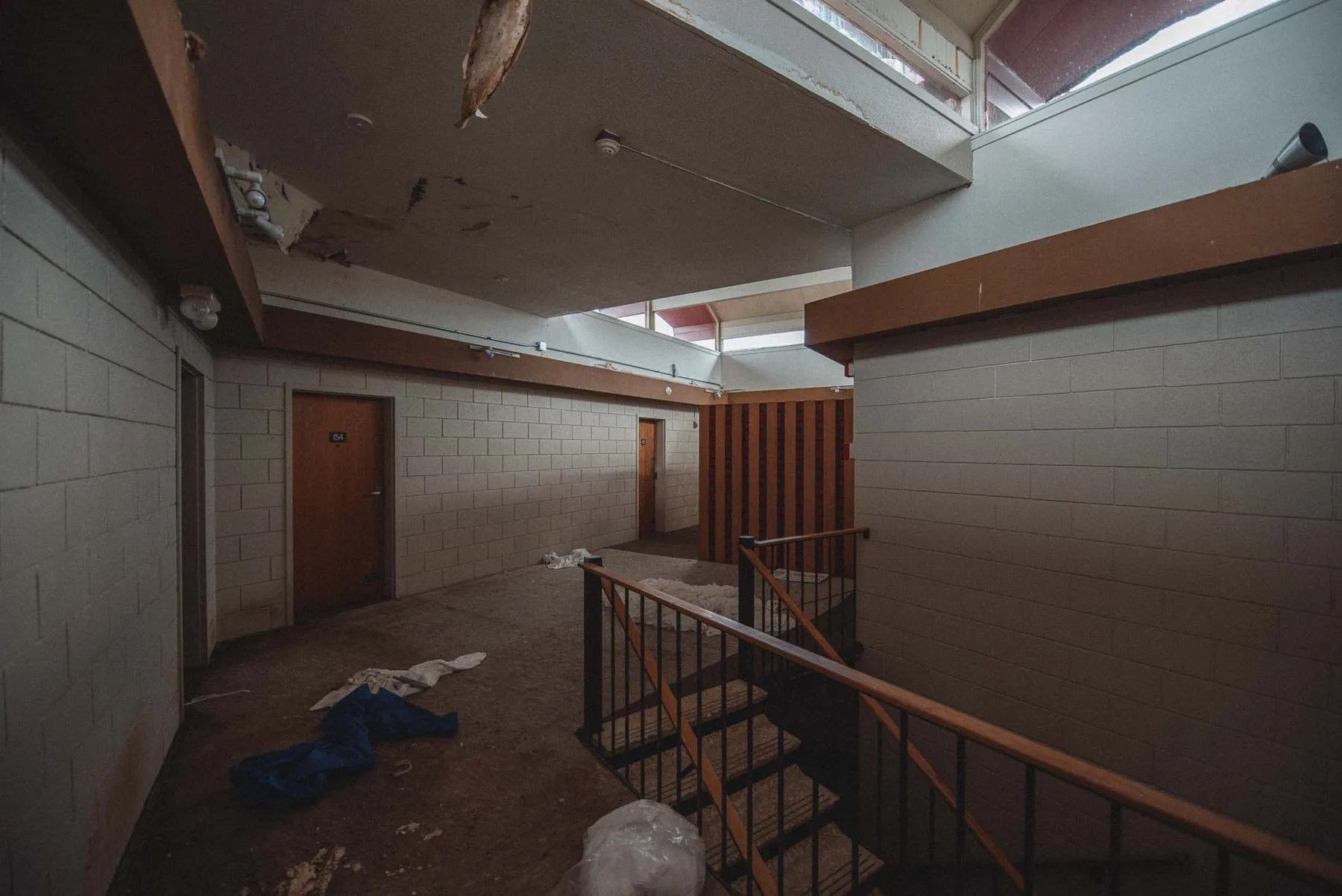 Hallway corner and stair landing inside the abandoned Vista Heights Inn